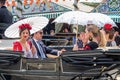 Seville, Spain - May 5, 2019: Young and beautiful women on a horse drawn carriage during the the April Fair of Seville on May, 5, Royalty Free Stock Photo