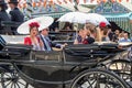 Seville, Spain - May 5, 2019: Young and beautiful women on a horse drawn carriage during the the April Fair of Seville on May, 5, Royalty Free Stock Photo