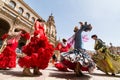 SEVILLE, SPAIN - MAY 2017: Young women dance flamenco on Plaza de Espana