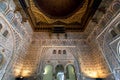 Beautiful interior of the 14th century Alcazar royal palace in Mudejar architecture style with patterned walls, Seville