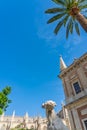 Monument of dog that looking thoughtfully into the distance at the Catedral of Seville