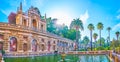 The pond and the Grotesque Gallery in Royal Alcazar Gardens in Seville, Spain Royalty Free Stock Photo