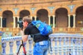 Photographers shooting scenic Plaza de Espana in Sevilla