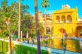 The tourist destination in Alcazar Palace Gardens in Seville, Spain Royalty Free Stock Photo