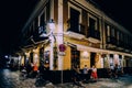 Tourists relaxing at terraces of traditional tapas bars at during in the historic centre of Seville, Andalusia, Spain