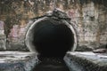 Sewage drainage pipe, sewage flows from the collector. Environmental pollution Royalty Free Stock Photo