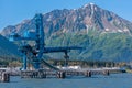 Closeup SUNEEL coal crane and transport belt on pier, Seward, Alaska, USA