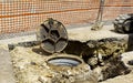 Sewer cover runneth over spilling water into