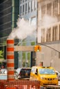 Sewer exhaust pipe city street Manhattan NYC Royalty Free Stock Photo