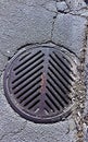 Sewer grate in asphalt