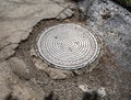 Sewer metal hatch on pavement