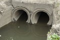 Sewer pipe. Canal with dirty water. Waste draining Royalty Free Stock Photo