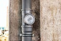 Sewer pipes in home basement. System of gray sanitary pipes in old house Royalty Free Stock Photo