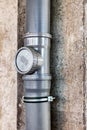 Sewer pipes in home basement. System of gray sanitary pipes in old house Royalty Free Stock Photo