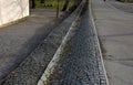 Sewer pipes under the bridge. crossing the ditch by the road.lear water