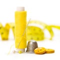 Sewing accessories: thread, needle and thimble Royalty Free Stock Photo