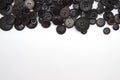 Sewing buttons background. Black sewing buttons texture Royalty Free Stock Photo