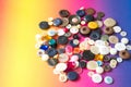 Sewing buttons on colorful background Royalty Free Stock Photo