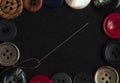 Sewing buttons frame background with needle