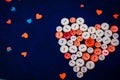 Sewing buttons in the shape of a heart Royalty Free Stock Photo