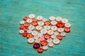 Sewing buttons in the shape of a heart Royalty Free Stock Photo