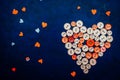 Sewing buttons in the shape of a heart Royalty Free Stock Photo