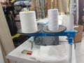 Sewing factory manufacture craft business with overlock sewing machine and white thread