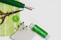 Sewing handicraft concept in shades of green