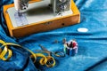 Sewing indigo denim jeans with sewing machine, garment industrial concept. Royalty Free Stock Photo