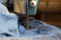 Sewing jeans.