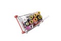 Sewing kit in a trolley isolated on white background. Colorful thread coils. Top view. Royalty Free Stock Photo