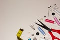 Sewing kit and utensils on white background. Lots of color with copy space and copy writing Royalty Free Stock Photo