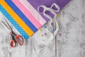 Sewing, Knitting And Crochet Accessories. Fabric, Wooden Table. Royalty Free Stock Photo