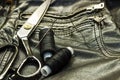 Sewing leather jacket, repair of leather jacket scissors, thread, close-up. Products of leather