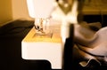 Sewing machine and beautiful grey cloth. Fashion concept. Hobby ideas