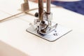 Sewing machine, closeup needle and presser foot with holder