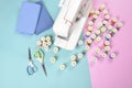 Sewing machine and colorful thread rolls for sewing on two tone Royalty Free Stock Photo