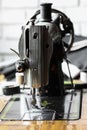 The sewing machine and item of clothing, Detail of sewing machine and sewing accessories, old sewing machine Royalty Free Stock Photo