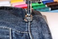 Sewing machine and item of clothing material Royalty Free Stock Photo
