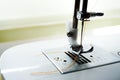 Sewing machine needle bobbin and stitch settings details close up view Royalty Free Stock Photo