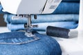 Sewing Machine Sew Jeans Fabric. Royalty Free Stock Photo