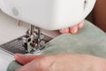 Sewing machine, stitching fabrics, needle in a round plan