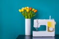 Sewing machine on table in workshop. Royalty Free Stock Photo