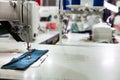 Sewing machine on textile fabric closeup, nobody Royalty Free Stock Photo