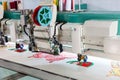 Sewing machine on textile fabric, nobody Royalty Free Stock Photo