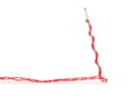 Sewing needle with red thread isolated on white Royalty Free Stock Photo
