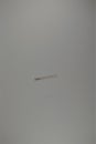 Sewing needle on white desk surface. Place for text
