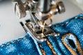 Sewing process denim material Royalty Free Stock Photo
