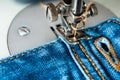 Sewing process denim material Royalty Free Stock Photo