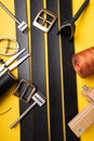 Sewing process of the leather belt. Tools, materials and accessories for leather workshop. Vintage sewing industrial Royalty Free Stock Photo